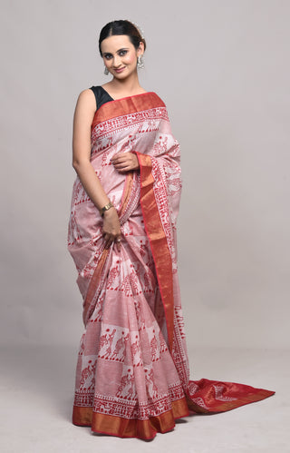 Model wearing Kosakari Rangayan red blended Kosa silk hand block printed saree with tribal motifs and red border.