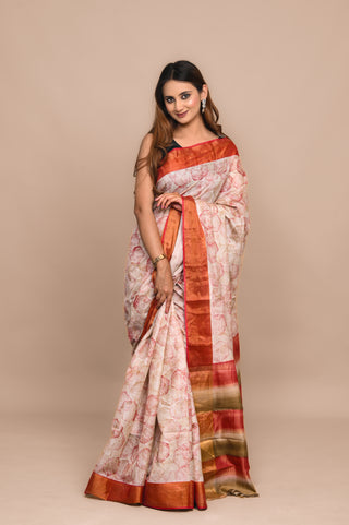Model wearing Kosakari Aranyani brown blended Kosa silk hand block printed saree with tribal geometric motifs and earthy tones.