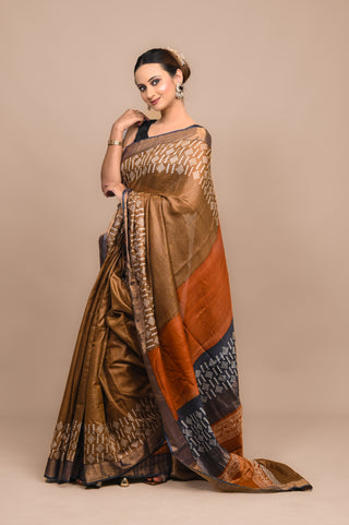 Model wearing Kosakari Raktima pure Kosa silk handwoven saree with buti motifs and golden border