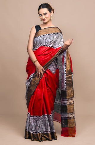 Model wearing Kosakari Gajangana red blended Kosa silk hand block printed saree with Madhubani elephant motifs and folk art border.